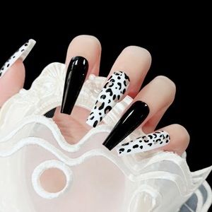 New 24 piece Press On Nails with tabs and kit to adhere